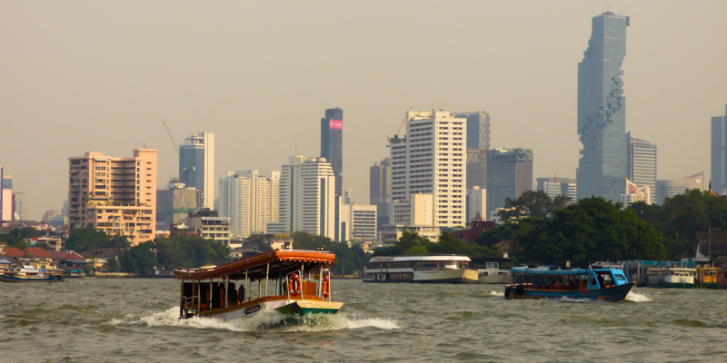 Boats and Bangkok's skyline Boats and Bangkok's skyline