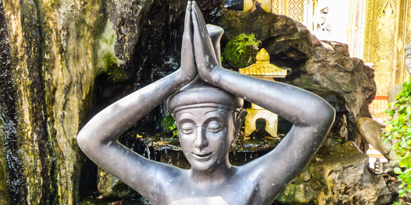 Reusi Datton statue at Wat Pho temple grounds in Bangkok