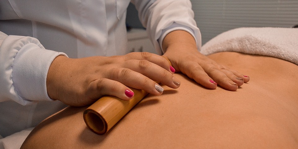 Client receiving Bamboo Massage Therapy