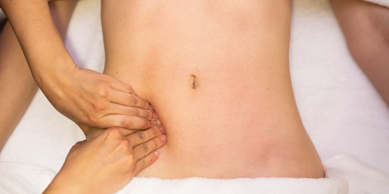 Acupressure on the abdomen