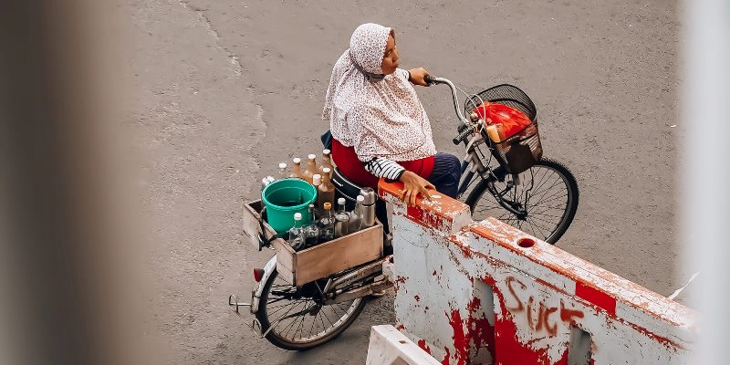 Indonesian woman selling herbal medicine