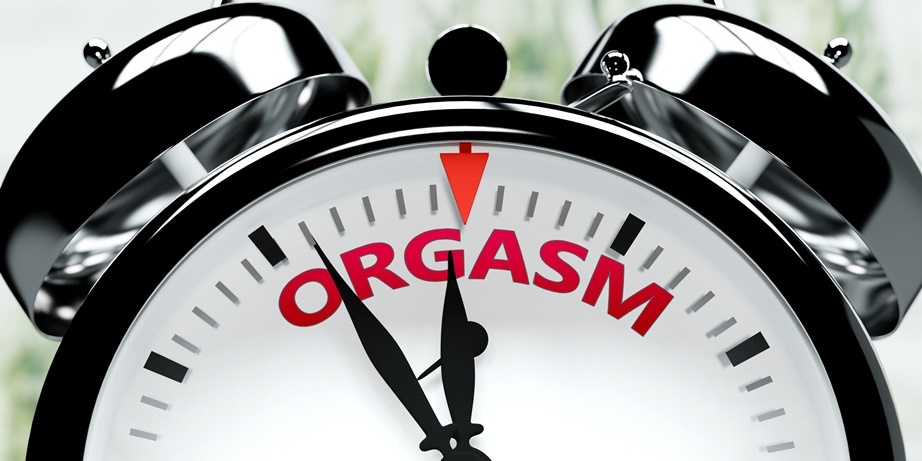 Clock with Orgasm written on it