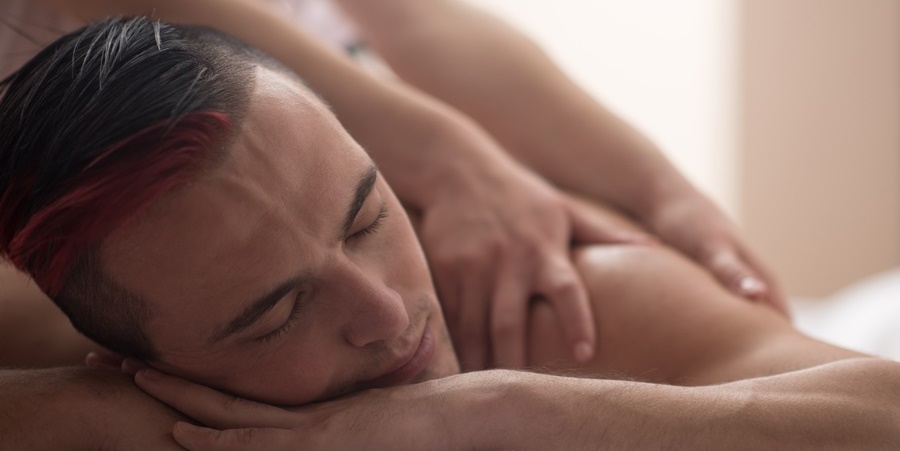Man receiving sensual erotic massage