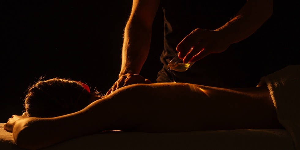 Woman receiving sensual erotic massage