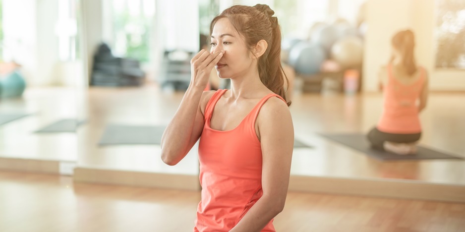 Woman doing Yogic Breathwork