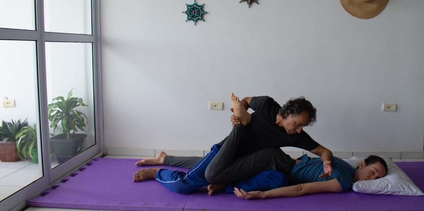 Thai Massage Forearm Roll on the Back