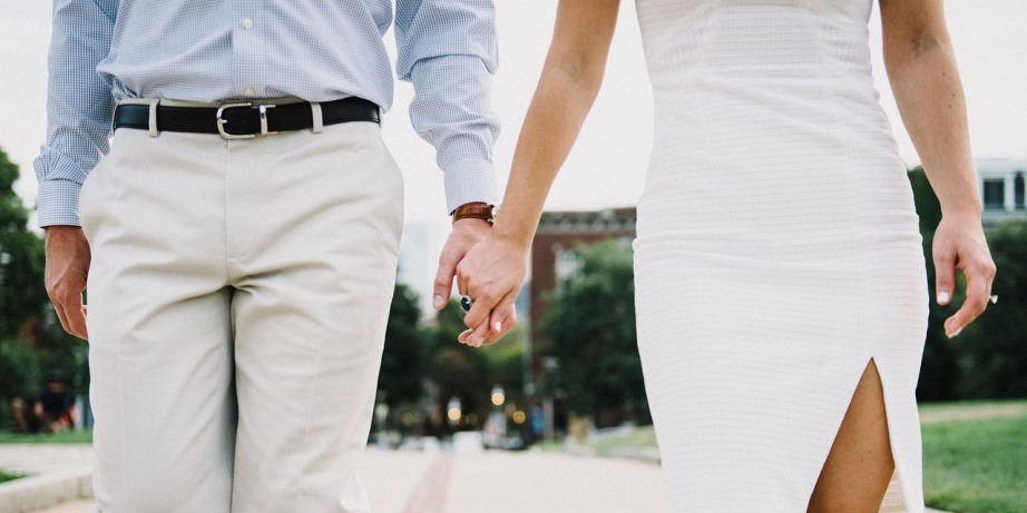 Man and woman walking hand in hand