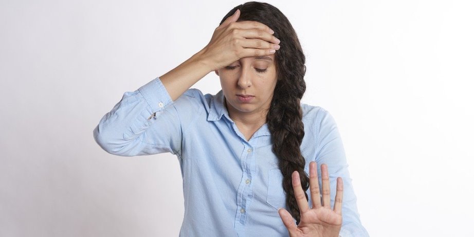 Woman having a headache of something