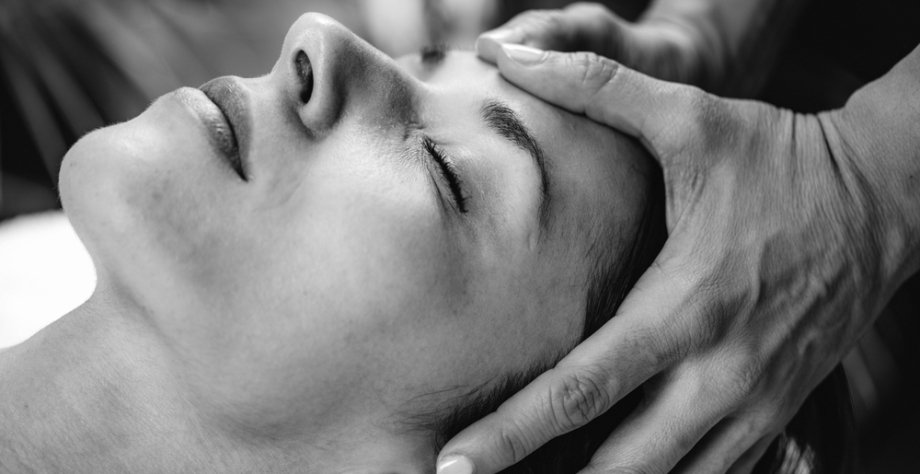 Person receiving head massage
