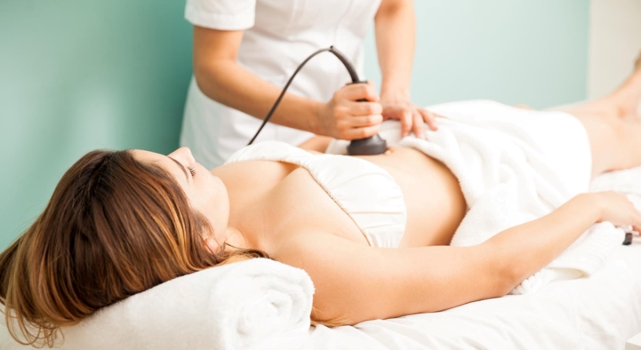 Woman undergoing fat reduction therapy