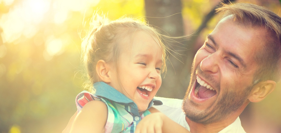 Happy father with happy daughter