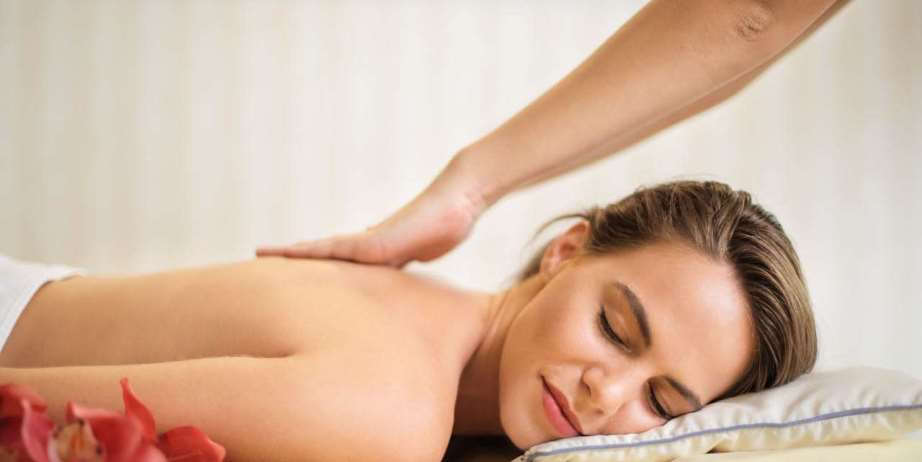 Woman receiving sensual massage