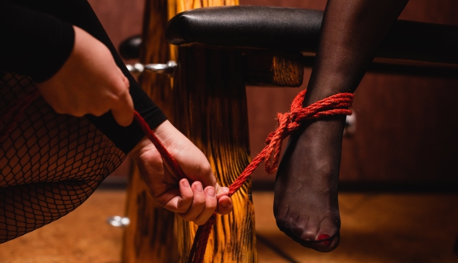Woman engaging in bondage therapy