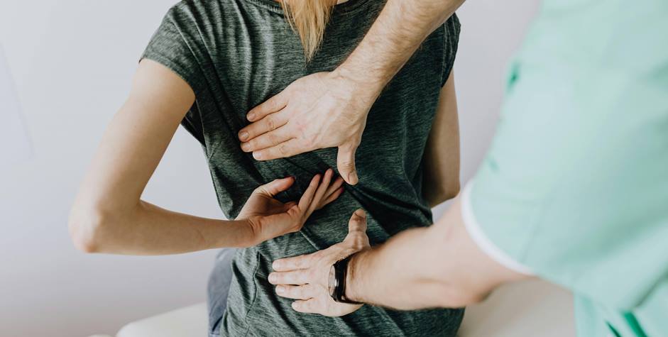 Back examination by doctor