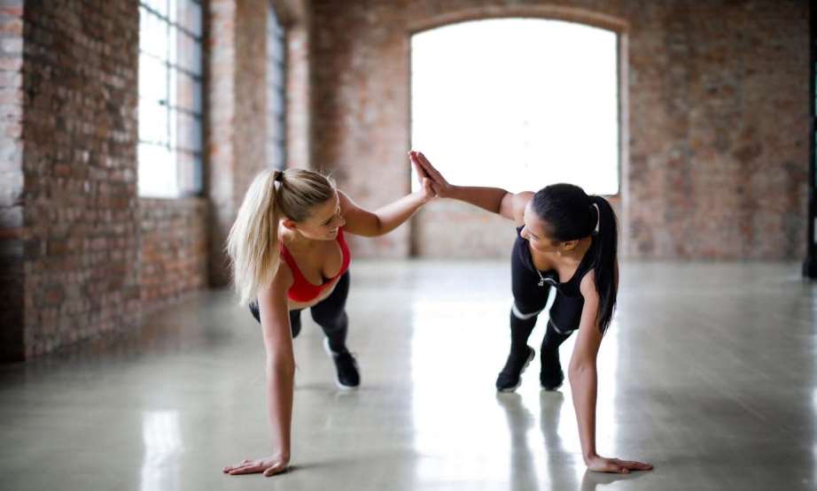 Two women working out together