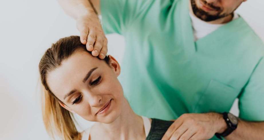 Massage therapy session treating shoulder and neck pains