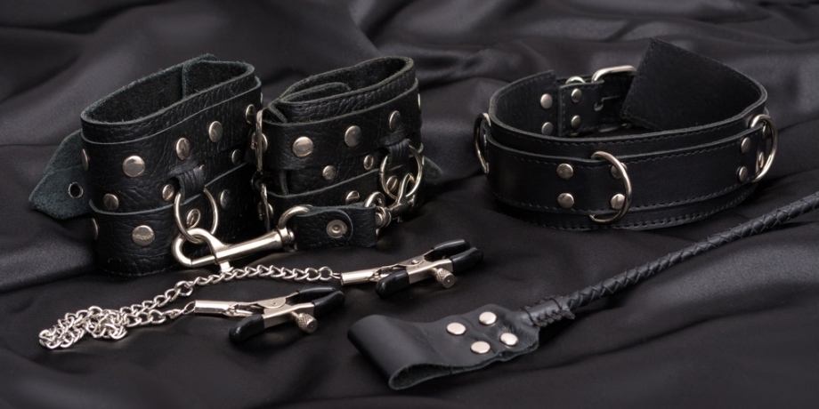 Tantra massage session on a bed