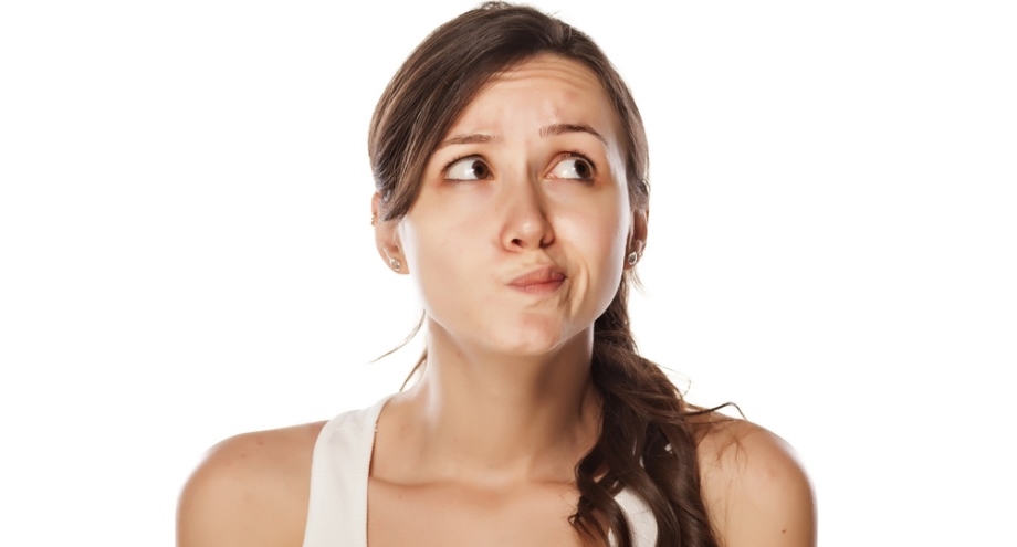 Confused questioning woman