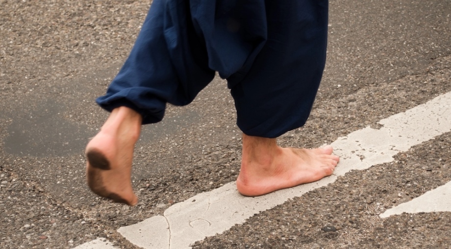 Man walking barefoot on the streets