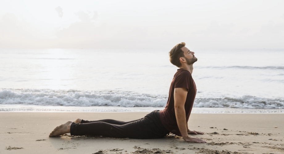 Yogic stretching on the beach