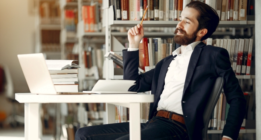 Man studying in library