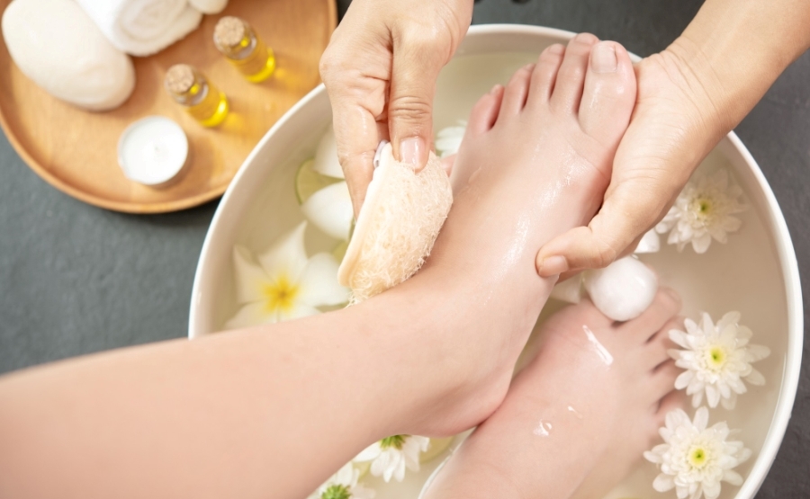 Taking Foot Baths, a Foot Wash, or Foot Soak Woman having a foot bath from therapist