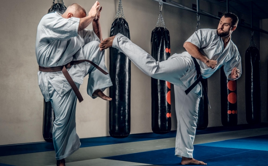 Why Martial Arts Are Practiced Barefoot Two martial arts practitioners in combat